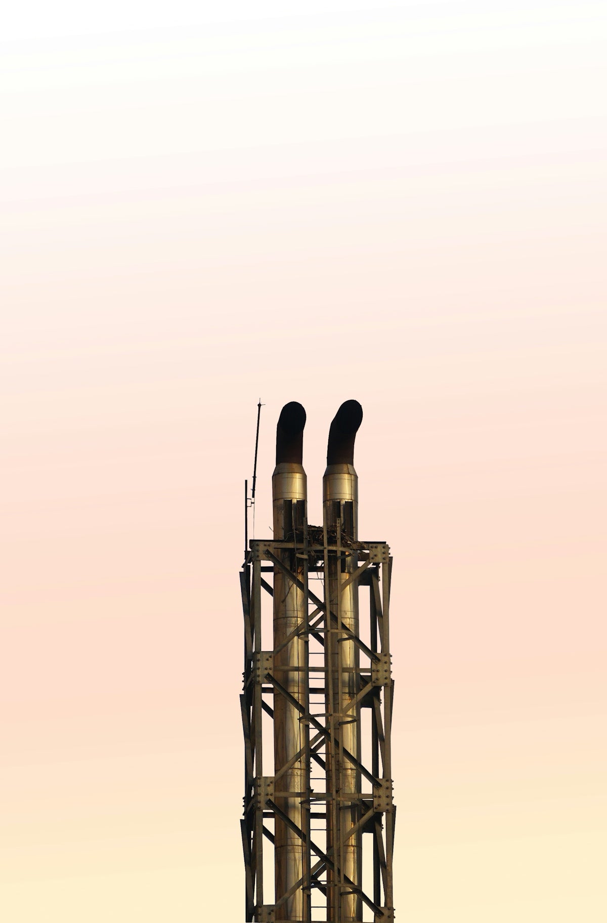 brass-colored chimney tower