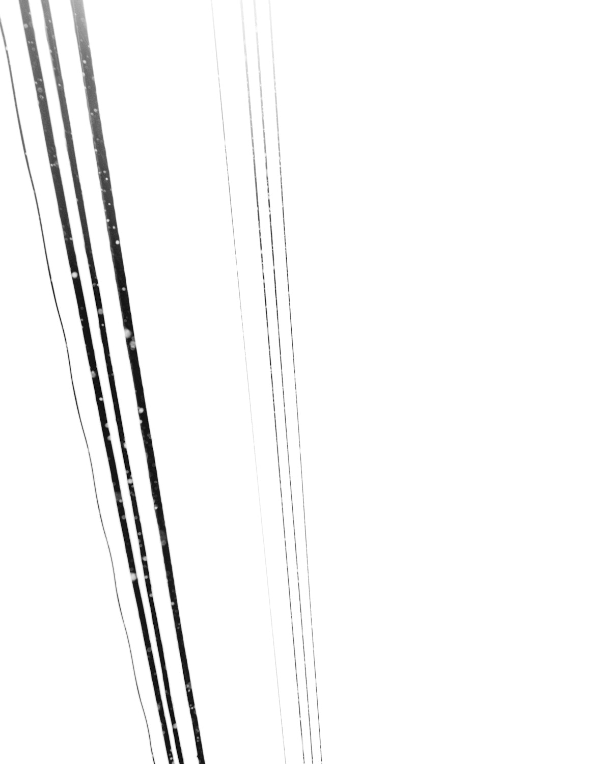 a man riding skis down a snow covered slope