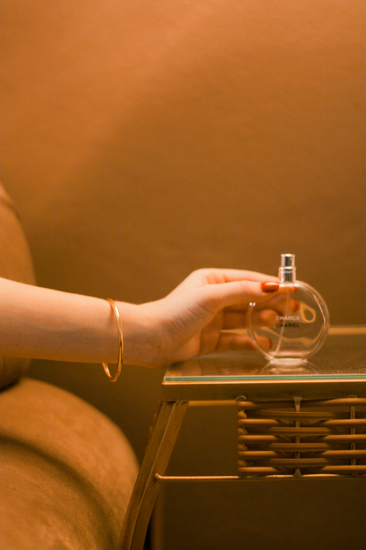 person holding clear glass cup