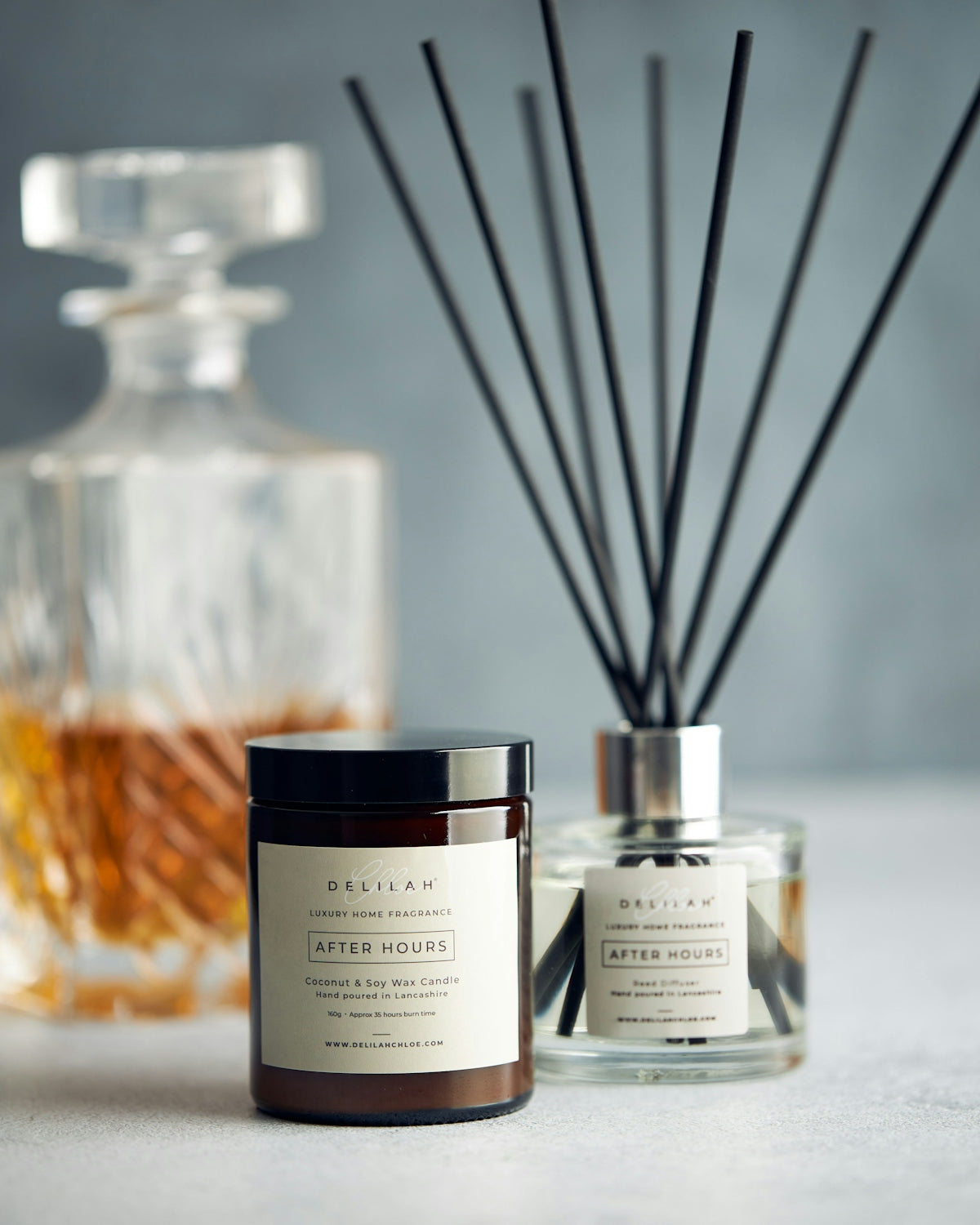 a couple of glass bottles with brown liquid in them