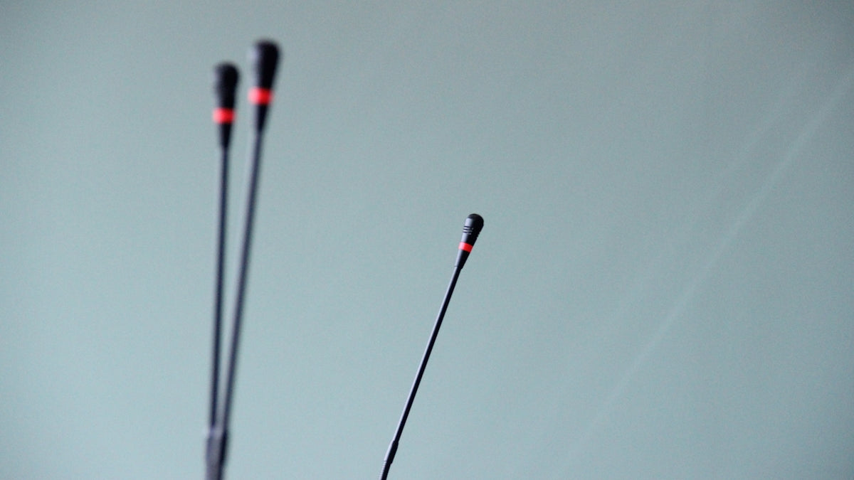 a pair of ski poles sticking out of the ground