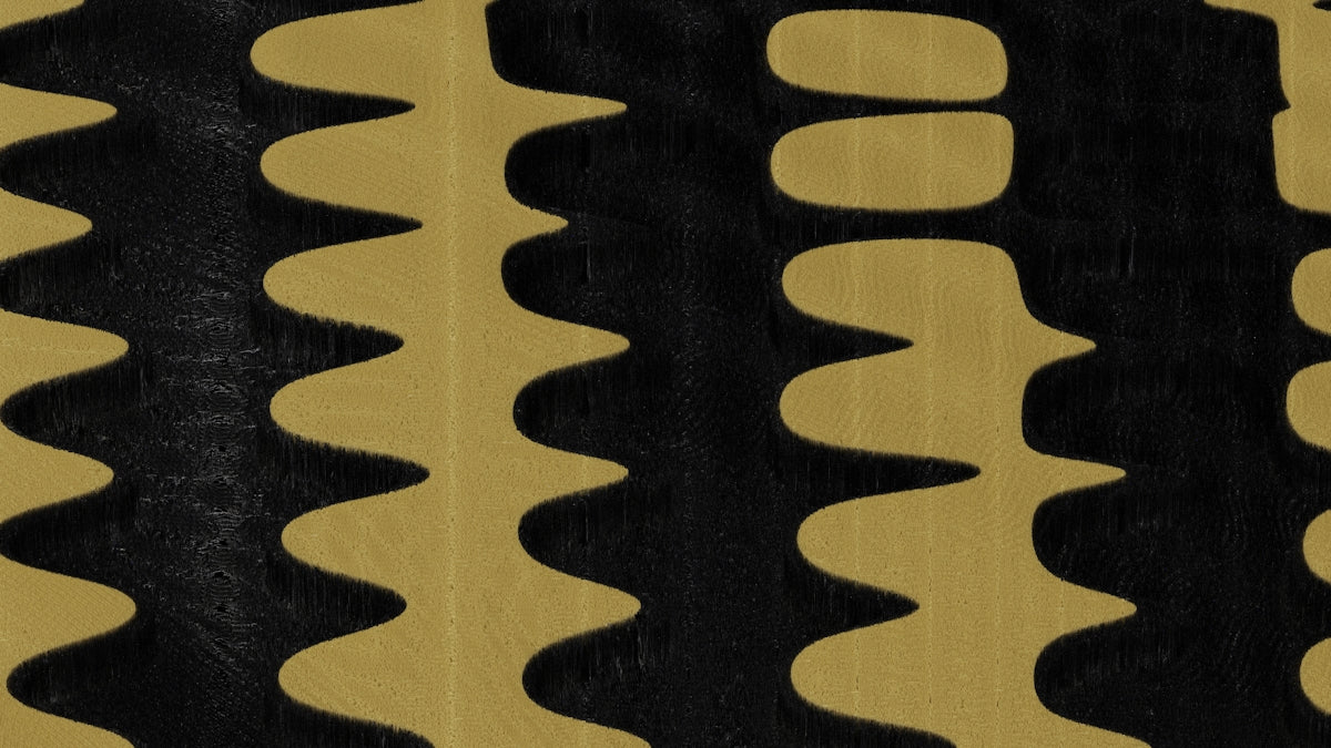 A close up of a black and yellow wallpaper
