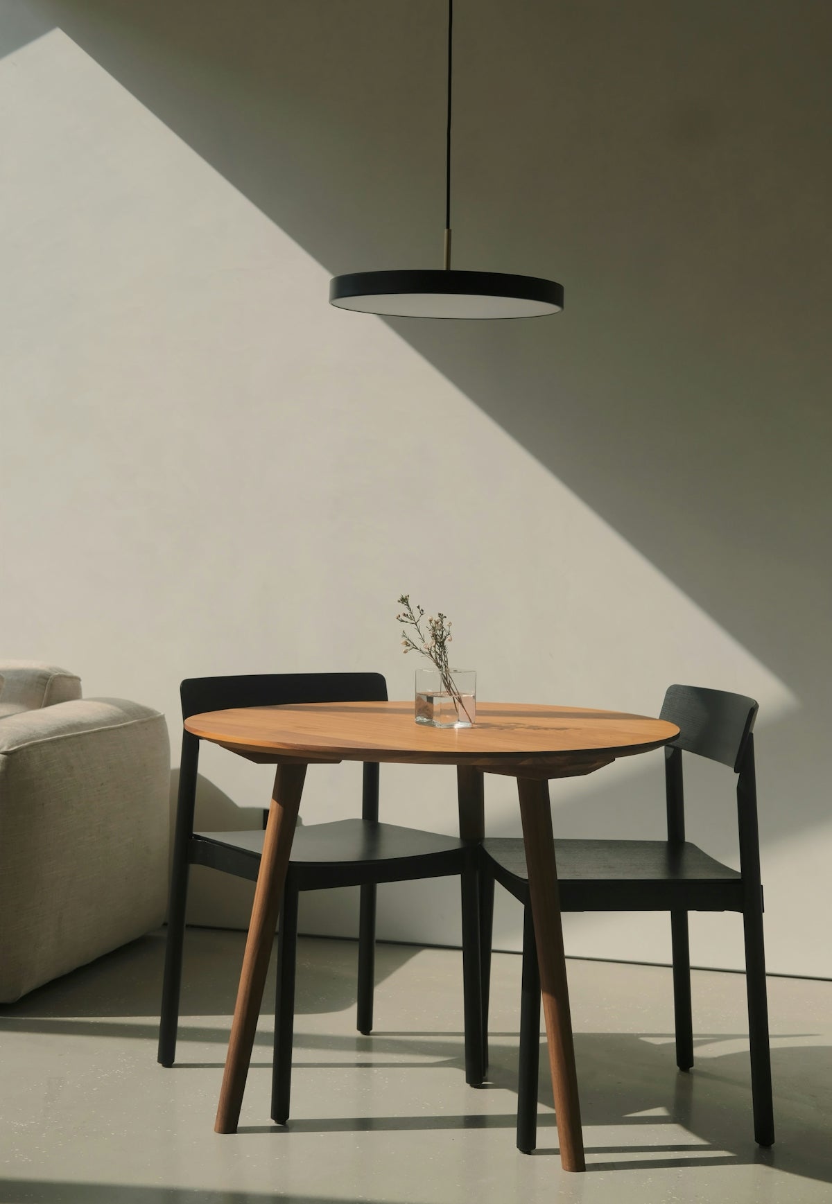 A living room with a couch and a table