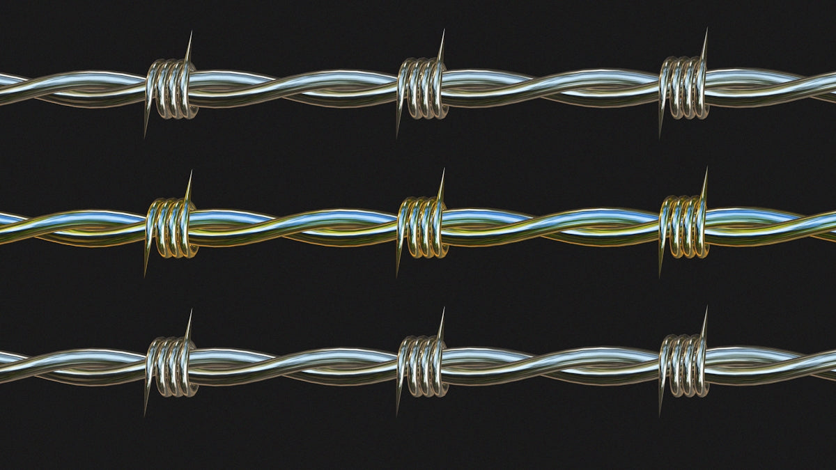 A close up of a metal object with a black background