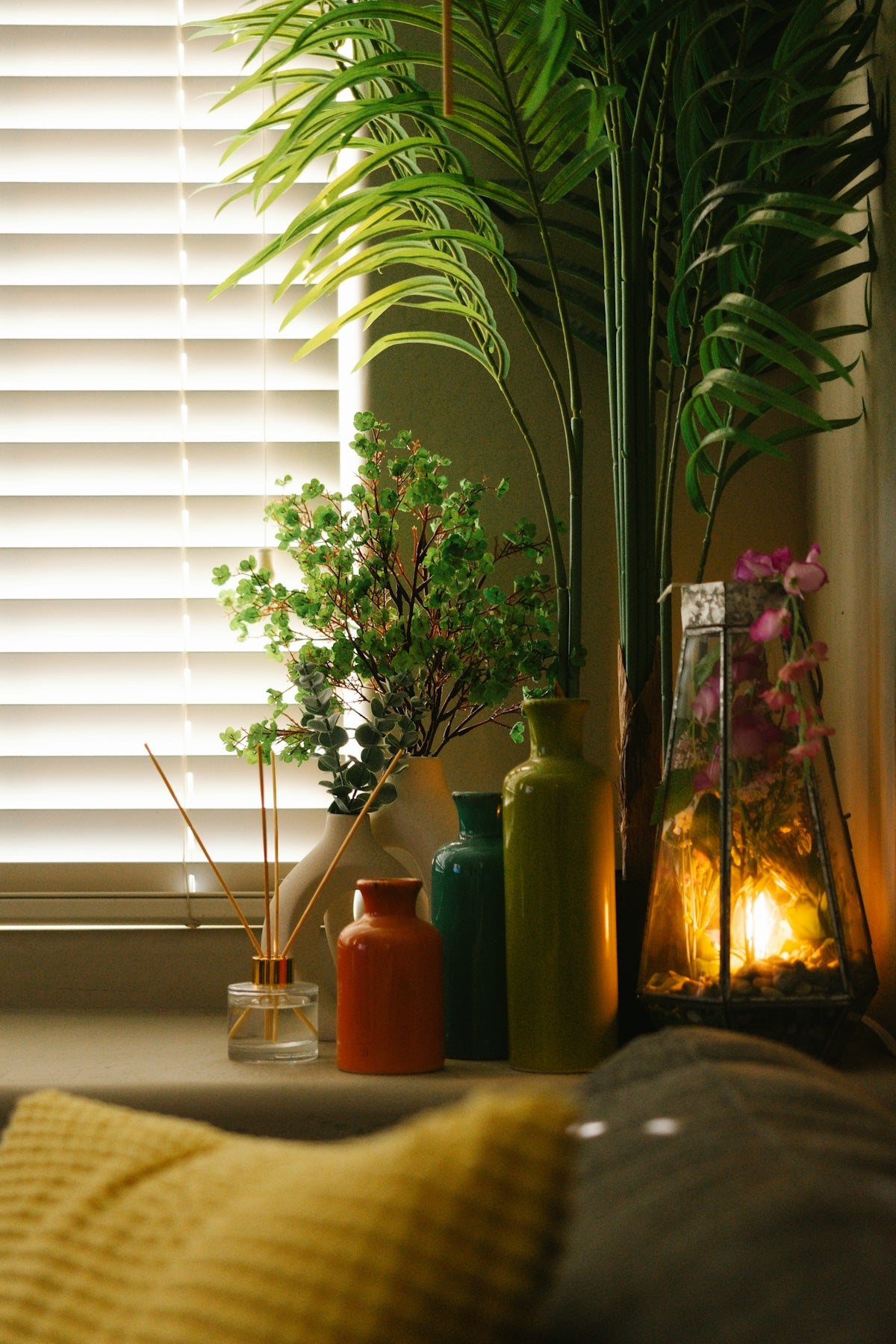 Decorative vases and plants on a windowsill