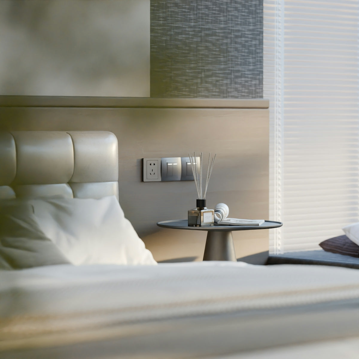 Modern bedroom with a bedside table and diffuser.